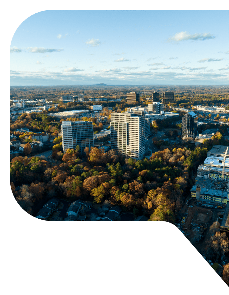 Aerial view of Dunwoody, Georgia with Stone Mountain on the horizon in the background.