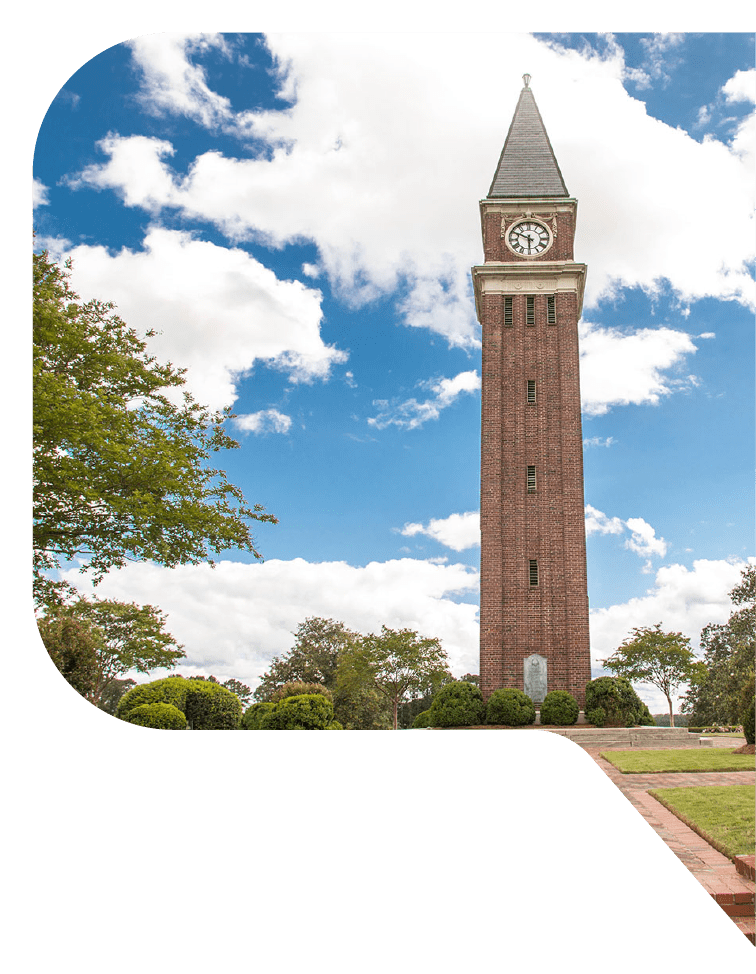 A tall clock tower overlooks a park in LaGrange, Georgia.
