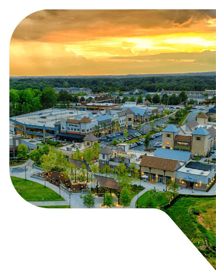 Aerial view of a shopping district in Norcross, Georgia at sunset.