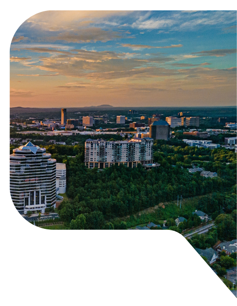 Sunset view of Smyrna, Georgie from up in the sky with Kennesaw Mountain in the background.